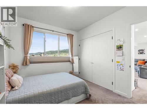7938 Graystone Drive, Coldstream, BC - Indoor Photo Showing Bedroom
