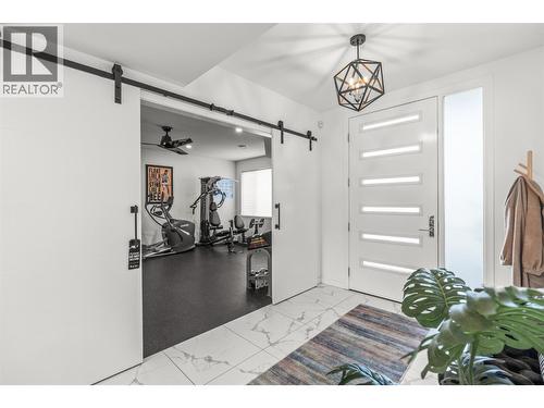 7938 Graystone Drive, Coldstream, BC - Indoor Photo Showing Gym Room