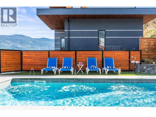 7938 Graystone Drive, Coldstream, BC - Outdoor With In Ground Pool