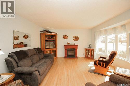 435 3Rd Avenue E, Shaunavon, SK - Indoor Photo Showing Living Room With Fireplace