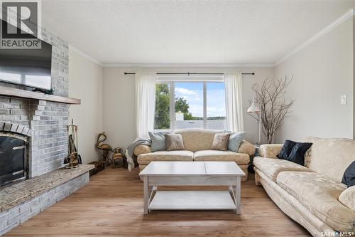 461 13Th Street E, Regina Beach, SK - Indoor Photo Showing Living Room With Fireplace