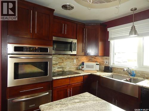 222 Westview Drive, Coronach, SK - Indoor Photo Showing Kitchen With Double Sink
