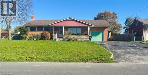 Brick exterior residence featuring a front porch with stone accents - 157 Schweitzer Street, Kitchener, ON - Outdoor