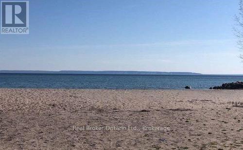 Ishpiming Beach - 24 Poplar Drive, Tiny, ON - Outdoor With Body Of Water With View