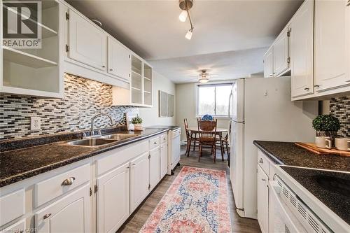 303-4 Avalon Place, Kitchener, ON - Indoor Photo Showing Kitchen With Double Sink