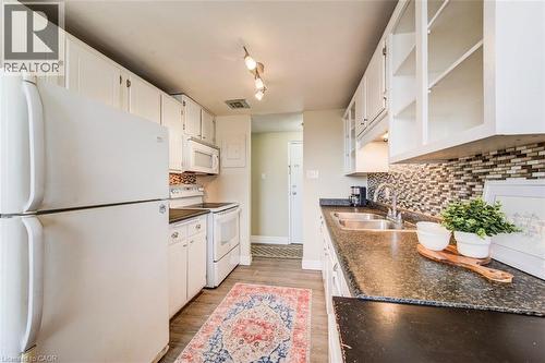 303-4 Avalon Place, Kitchener, ON - Indoor Photo Showing Kitchen With Double Sink
