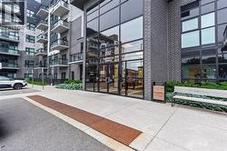 Property entrance featuring brick siding - 