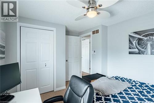 Neutral paint palette with textured carpeting - 560 Penny Lane, Waterloo, ON 