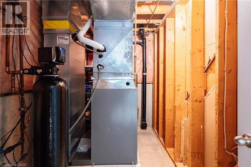 Water filtration system and furnace unit with exposed copper piping - 560 Penny Lane, Waterloo, ON 