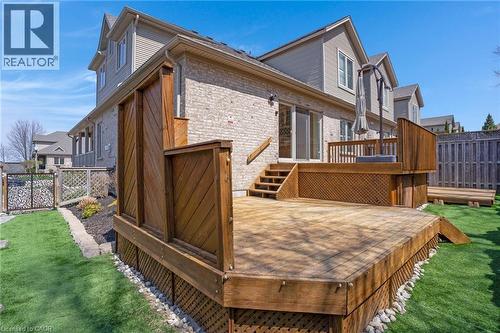 Multi-level wood deck with lattice skirting and integrated stairs - 227 Chestnut Hill Crescent, Kitchener, ON - Outdoor With Deck Patio Veranda With Exterior
