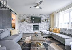 Family Room Gas F/P Stone surround - 