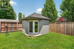 Shed on a large concrete pad. - 