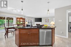 Granite island with dishwasher. - 