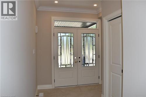 Entryway featuring double doors with decorative glass panels and a transom window - 8 Dunlop Road, Hamilton, ON - Indoor Photo Showing Other Room