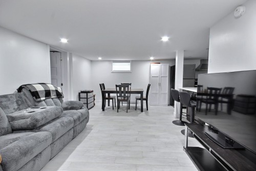 Living Room - 109  - 111 Rue Des Oblats E., Rouyn-Noranda, QC 