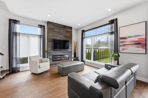 Salon - 123 Av. Du Littoral, Saint-Paul, QC - Indoor Photo Showing Living Room With Fireplace