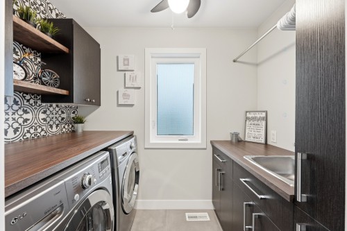 Salle de lavage - 123 Av. Du Littoral, Saint-Paul, QC - Indoor Photo Showing Laundry Room