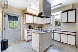 Kitchen Walk Out to Back Yard - 