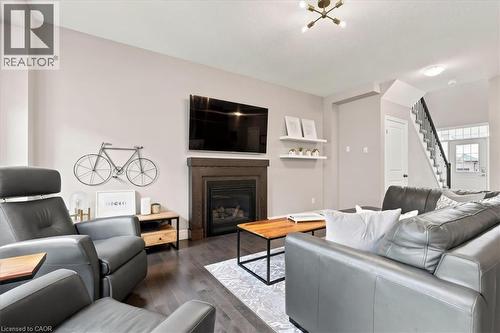 921 Eden Oak Court, Kitchener, ON - Indoor Photo Showing Living Room With Fireplace