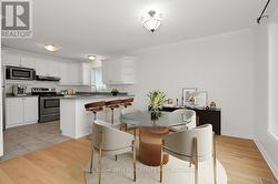 Virtually Staged-Dining Room/Kitchen - 