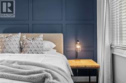Accent wall featuring blue paneling - 
