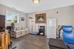 2nd bedroom off the living room has sliding doors. Currently used as an office area. - 