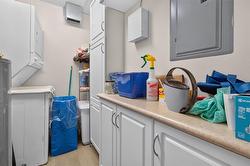 Laundry room. Washer.dryer. Extra storage. - 