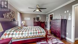 Primary bedroom with ensuite and walk-in closet. - 