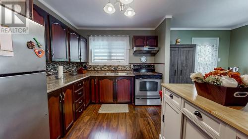 Kitchen with stainless steel appliances and kitchen Island - 92 Watson Crescent, St. John'S, NL 