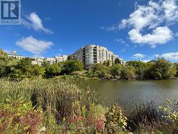 406 - 2511 LAKESHORE ROAD W Oakville (Br Bronte), ON L6L 6L9