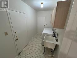 Main Floor Laundry; access to garage & side yard - 