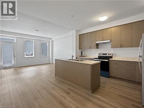 KITCHEN AND LIVING ROOM - 82 Gledhill Crescent, Cambridge, ON - Indoor Photo Showing Kitchen With Stainless Steel Kitchen