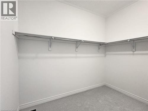 PRIMARY WALK-IN CLOSET - 82 Gledhill Crescent, Cambridge, ON - Indoor With Storage
