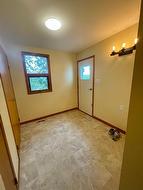 Entrance into home with double closets - 