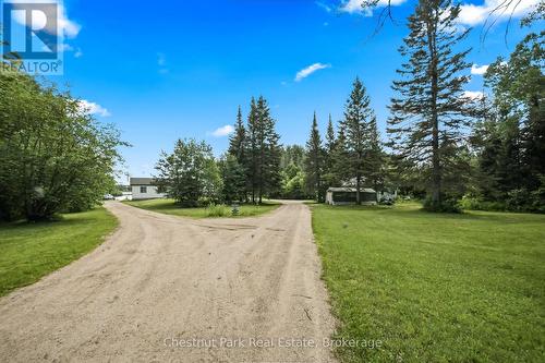 Circular driveway in - tucked in from Road - 37 Rose Drive, Kearney, ON 