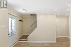 Front Foyer And Stairs for upper level - 