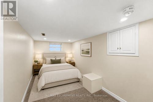 Virtually Staged - Basement Bedroom - 309 Cope Street, Hamilton, ON - Indoor Photo Showing Bedroom