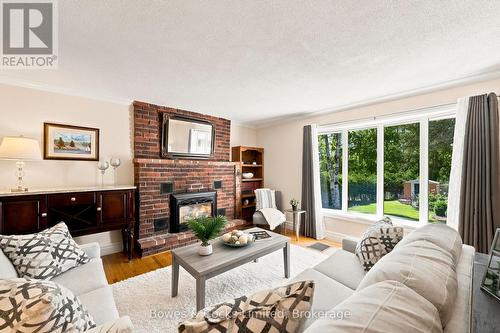 1818 County Road 2, Otonabee-South Monaghan, ON - Indoor Photo Showing Living Room With Fireplace