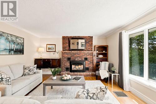 1818 County Road 2, Otonabee-South Monaghan, ON - Indoor Photo Showing Living Room With Fireplace
