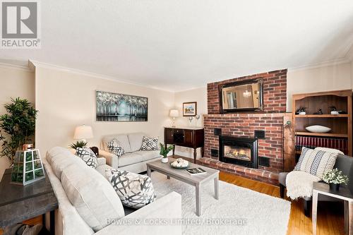 1818 County Road 2, Otonabee-South Monaghan, ON - Indoor Photo Showing Living Room With Fireplace