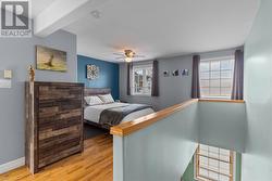 Bright, spacious 3rd-floor primary bedroom. - 