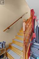 Hardwood stairs to the 2nd level. - 