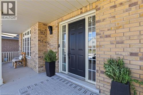 Brick exterior with covered front porch - 56 Mccaffery Crescent, St. Catharines, ON 