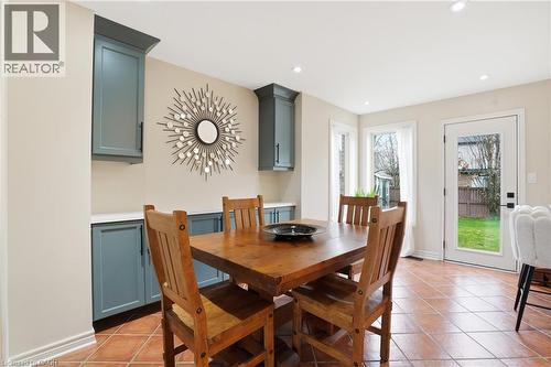 Dining area featuring terracotta-style tile flooring and recessed lighting - 56 Mccaffery Crescent, St. Catharines, ON 