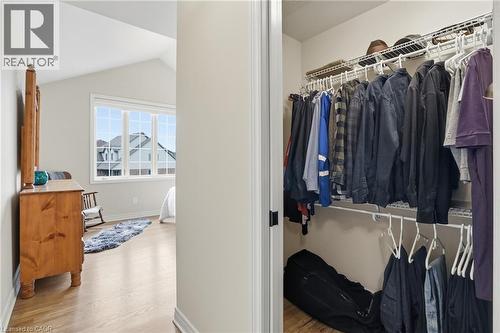 Integrated closet organization system featuring dual-level wire shelving and hanging rods - 56 Mccaffery Crescent, St. Catharines, ON 