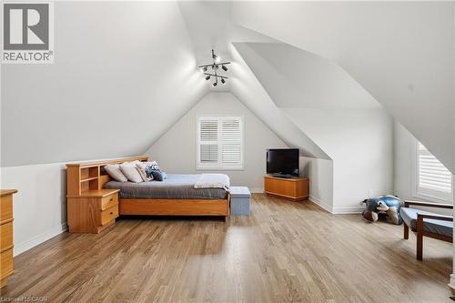 Vaulted ceiling room with wood-finish flooring - 56 Mccaffery Crescent, St. Catharines, ON 