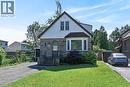 Stone veneer and siding exterior with a prominent bay window - 83 Aberfoyle Avenue, Hamilton, ON 