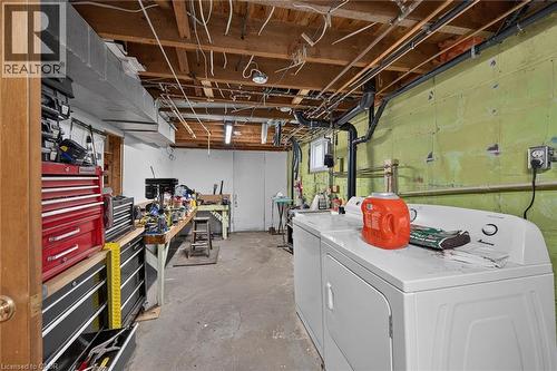 Basement area featuring exposed ceiling joists and concrete flooring - 83 Aberfoyle Avenue, Hamilton, ON 