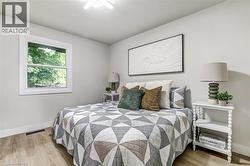 Neutral wall finishes complemented by wood-finish flooring - 