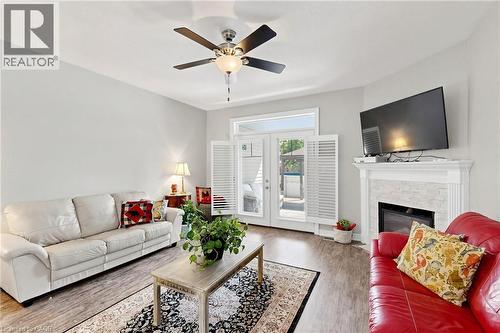 18 Gateway Avenue, West Lincoln, ON - Indoor Photo Showing Living Room With Fireplace